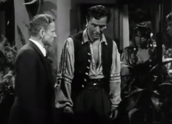 Ivan Triesault as Gestapo major Reimann with Ray Milland and Marlene Dietrich,, Golden Earrings (1947)